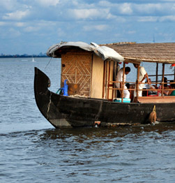 Cruise along the famed palm-fringed backwaters of Kerala Image